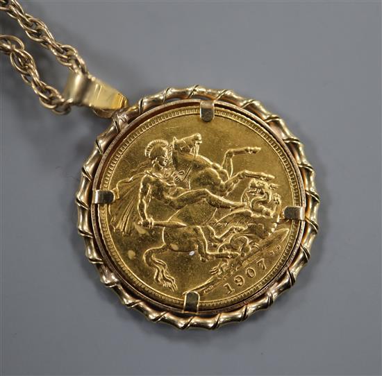 A gold full sovereign pendant, on 9ct chain.
